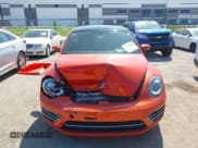 ✅ 2018 Volkswagen Beetle S • VIN: 3VWFD7AT7JM704868 • Лот: 43313404. Опубликован ранее на IAAI с пробегом 49 638 миль. Бесплатный доступ к архиву аукционных продаж из США и подробный отчёт об истории автомобиля на DreamBid. Изображение 12.