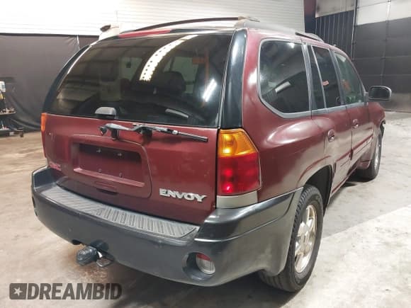 ✅ 2002 GMC Envoy SLT • VIN: 1GKDT13SX22426320 • Lot: 41709359. Listed on IAAI with 104,418 mi. Free auction sales archive from the USA and detailed vehicle history report at DreamBid. Image 4.
