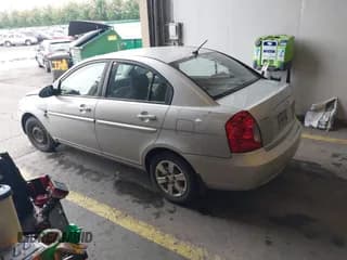 ✅ 2007 Hyundai Accent GLS • VIN: KMHCN46C87U088804 • Лот: 40425051. Опубликован ранее на IAAI с пробегом 158 509 миль. Бесплатный доступ к архиву аукционных продаж из США и подробный отчёт об истории автомобиля на DreamBid. Изображение 3.