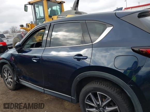 ✅ 2018 Mazda CX-5 Grand Touring • VIN: JM3KFBDM5J0426677 • Lot: 43579829. Listed on IAAI with 94,077 mi. Free auction sales archive from the USA and detailed vehicle history report at DreamBid. Image 14.