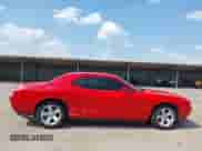 2014 Dodge Challenger SXT z VIN 2C3CDYAG5EH294823, wystawiony jako IAAI lot #43238375 z przebiegiem 153 229 mil mil oraz . Historia ofert i sprzedaży dostępna na DreamBid. Obrazek 13.