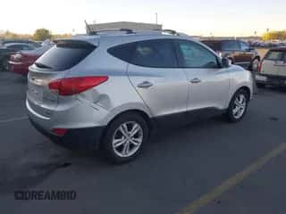 2012 Hyundai Tucson Limited with VIN KM8JUCAC2CU433184, listed as a IAAI auction lot 43557803 with 204,139 mi miles and . Bid and sale history available at DreamBid. Image 4.