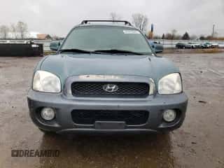 2001 Hyundai Santa Fe GLS z VIN KM8SC83D11U103866, wystawiony jako Copart lot #88311825 z przebiegiem 201 152 mil mil oraz Szkoda całkowita • Salvage title. Historia ofert i sprzedaży dostępna na DreamBid. Obrazek 5.