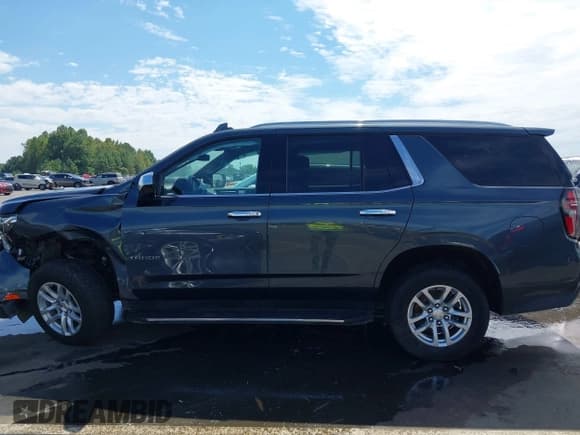 ✅ 2021 Chevrolet Tahoe LT • VIN: 1GNSKNKD4MR271166 • Lot: 43227233. Listed on IAAI with 128,404 mi. Free auction sales archive from the USA and detailed vehicle history report at DreamBid. Image 14.