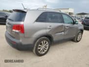 ✅ 2011 Kia Sorento EX • VIN: 5XYKUDA2XBG040734 • Lot: 86081315. Listed on Copart with 281,736 mi. Free auction sales archive from the USA and detailed vehicle history report at DreamBid. Image 3.