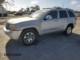 ✅ 2009 Jeep Grand Cherokee Limited • VIN: 1J8HS58P69C521028 • Lot: 77109564. Listed on Copart with 147,700 mi. Free auction sales archive from the USA and detailed vehicle history report at DreamBid. Image 1.