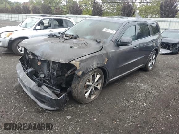 ✅ 2014 Dodge Durango R/T • VIN: 1C4SDJCT0EC978738 • Lot: 82023725. Listed on Copart with Not provided. Free auction sales archive from the USA and detailed vehicle history report at DreamBid. Image 1.