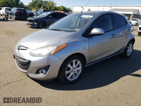 ✅ 2012 Mazda 2 Touring • VIN: JM1DE1LZ3C0150160 • Лот: 70886135. Опубликован ранее на Copart с пробегом 124 669 миль. Бесплатный доступ к архиву аукционных продаж из США и подробный отчёт об истории автомобиля на DreamBid. Изображение 1.