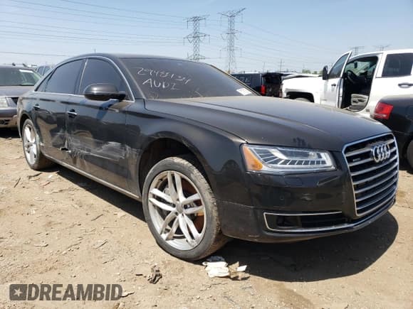 ✅ 2015 Audi A8 3.0L TDI • VIN: WAU3MAFD2FN006795 • Lot: 51791283. Listed on Copart with 106,415 mi. Free auction sales archive from the USA and detailed vehicle history report at DreamBid. Image 4.