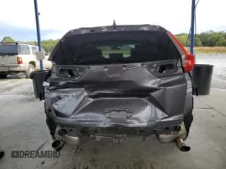 ✅ 2018 Honda CR-V EX • VIN: 7FARW1H59JE018001 • Лот: 81862655. Опубликован ранее на Copart с пробегом 61 337 миль. Бесплатный доступ к архиву аукционных продаж из США и подробный отчёт об истории автомобиля на DreamBid. Изображение 6.