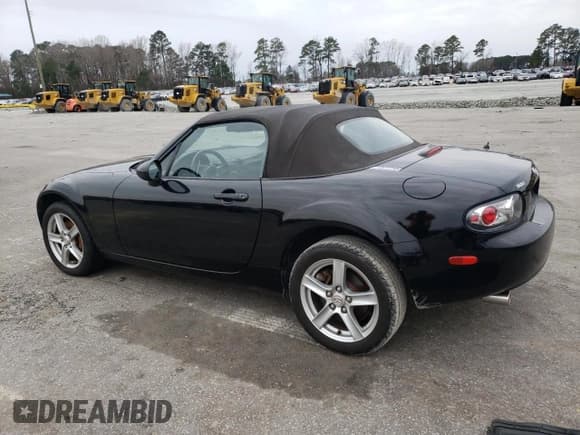 ✅ 2006 Mazda MX-5 Miata Sport • VIN: JM1NC25F360107106 • Lot: 48221425. Listed on Copart with 132,137 mi. Free auction sales archive from the USA and detailed vehicle history report at DreamBid. Image 2.