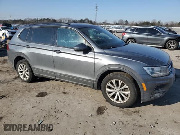 ✅ 2018 Volkswagen Tiguan S • VIN: 3VV0B7AX3JM011749 • Lot: 42447855. Listed on Copart with 160,527 mi. Free auction sales archive from the USA and detailed vehicle history report at DreamBid. Image 4.