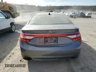 2013 Hyundai Azera z VIN KMHFH4JG0DA249500, wystawiony jako Copart lot #78507004 z przebiegiem 126 295 mil mil oraz Szkoda całkowita • Salvage title. Historia ofert i sprzedaży dostępna na DreamBid. Obrazek 6.