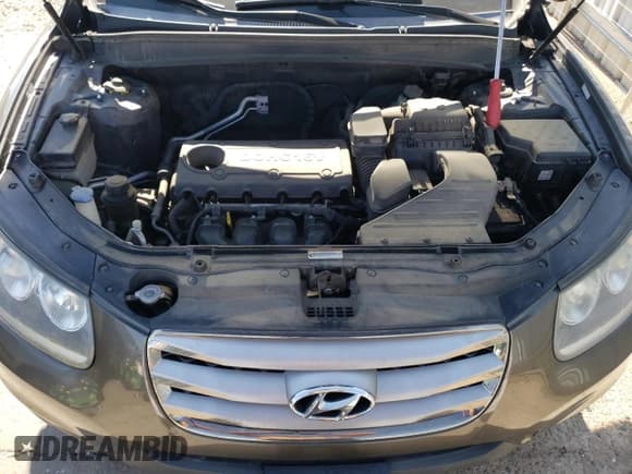 ✅ 2012 Hyundai Santa Fe GLS • VIN: 5XYZGDAB2CG152841 • Lot: 69445724. Listed on Copart with 131,617 mi. Free auction sales archive from the USA and detailed vehicle history report at DreamBid. Image 12.
