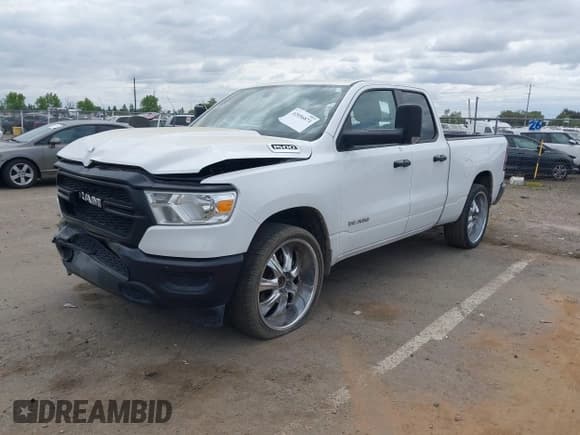 ✅ 2020 Ram 1500 Tradesman • VIN: 1C6SRECG6LN386006 • Lot: 42056871. Listed on IAAI with 108,037 mi. Free auction sales archive from the USA and detailed vehicle history report at DreamBid. Image 2.