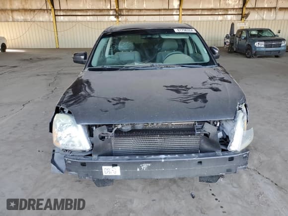 ✅ 2007 Mercury Montego Premier • VIN: 1MEHM43137G602765 • Лот: 81796354. Опубликован ранее на Copart с пробегом Не указан. Бесплатный доступ к архиву аукционных продаж из США и подробный отчёт об истории автомобиля на DreamBid. Изображение 5.