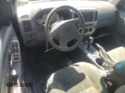 ✅ 2007 Ford Escape Hybrid • VIN: 1FMCU49H07KB60889 • Lot: 71118925. Wystawiony na Copart z przebiegiem 99 990 mil. Bezpłatny archiwum sprzedaży aukcyjnych z USA i szczegółowy raport historii pojazdu na DreamBid. Zdjęcie 8.