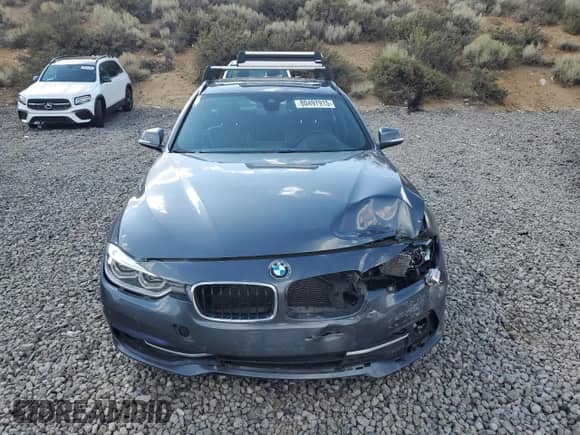 2018 BMW 3 Series 328d xDrive with VIN WBA8J1C55JA379468, listed as a Copart auction lot 80497915 with 84,486 mi miles and Salvage title. Bid and sale history available at DreamBid. Image 5.