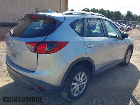 ✅ 2016 Mazda CX-5 Sport • VIN: JM3KE2BY0G0816281 • Lot: 43349897. Listed on IAAI with 73,030 mi. Free auction sales archive from the USA and detailed vehicle history report at DreamBid. Image 4.