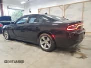 ✅ 2015 Dodge Charger SXT • VIN: 2C3CDXHG4FH777351 • Lot: 90296785. Listed on Copart with 165,364 mi. Free auction sales archive from the USA and detailed vehicle history report at DreamBid. Image 2.