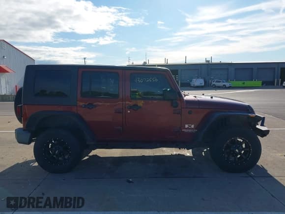 ✅ 2007 Jeep Wrangler X • VIN: 1J4GA39167L107341 • Lot: 43072556. Listed on IAAI with Not provided. Free auction sales archive from the USA and detailed vehicle history report at DreamBid. Image 13.