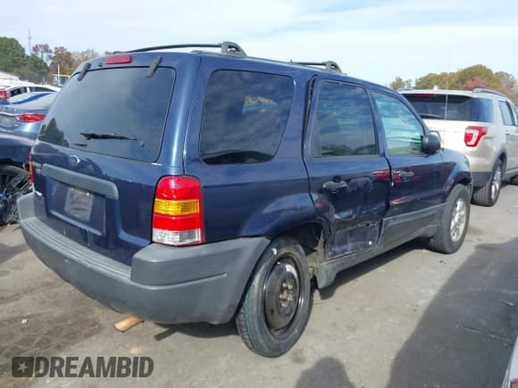 ✅ 2003 Ford Escape XLT Popular • VIN: 1FMYU03103KA70873 • Lot: 43625067. Listed on IAAI with 221,621 mi. Free auction sales archive from the USA and detailed vehicle history report at DreamBid. Image 6.