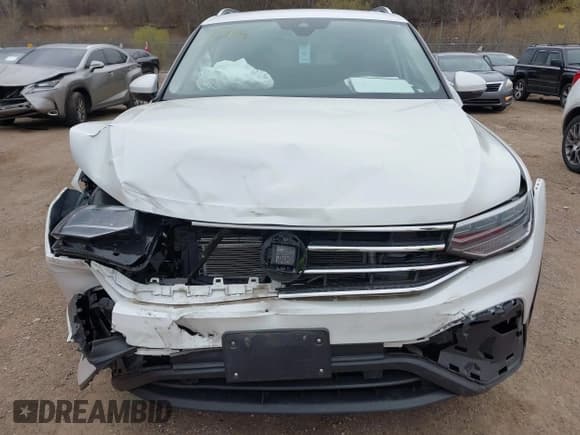 ✅ 2023 Volkswagen Tiguan SE • VIN: 3VVNB7AX4PM100180 • Lot: 42062208. Listed on IAAI with 12,922 mi. Free auction sales archive from the USA and detailed vehicle history report at DreamBid. Image 6.