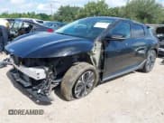 ✅ 2023 Kia EV6 Wind • VIN: KNDC34LAXP5106050 • Lot: 42770842. Wystawiony na IAAI z przebiegiem 17 572 mil. Bezpłatny archiwum sprzedaży aukcyjnych z USA i szczegółowy raport historii pojazdu na DreamBid. Zdjęcie 20.