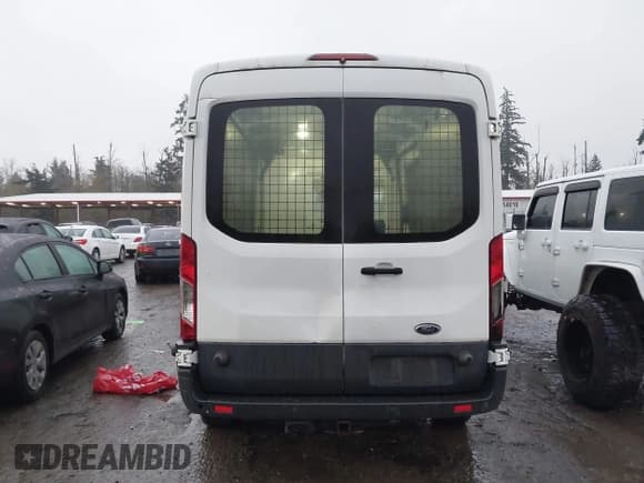 ✅ 2015 Ford Transit Cargo • VIN: 1FTSW2CM6FKA81973 • Lot: 43839496. Listed on IAAI with 115,336 mi. Free auction sales archive from the USA and detailed vehicle history report at DreamBid. Image 17.