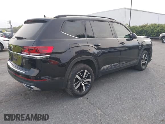 ✅ 2023 Volkswagen Atlas SE • VIN: 1V2LP2CA1PC540019 • Lot: 43025541. Listed on IAAI with 35,077 mi. Free auction sales archive from the USA and detailed vehicle history report at DreamBid. Image 4.