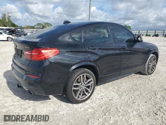 ✅ 2017 BMW X4 M40i • VIN: 5UXXW7C55H0U24877 • Lot: 71824502. Listed on Copart with Not provided. Free auction sales archive from the USA and detailed vehicle history report at DreamBid. Image 3.