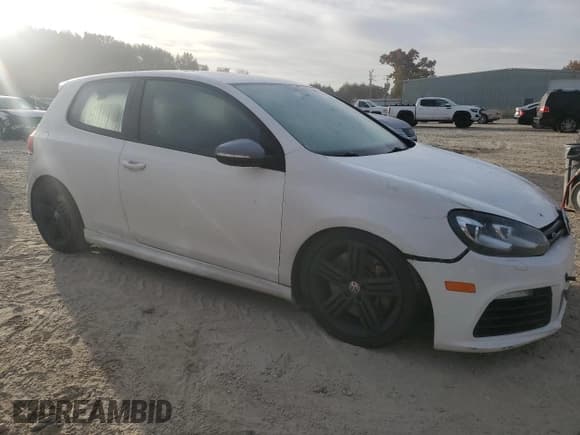 ✅ 2012 Volkswagen Golf R w/Sunroof & Navi • VIN: WVWRF7AJ4CW313656 • Лот: 79659554. Опубликован ранее на Copart с пробегом 125 728 миль. Бесплатный доступ к архиву аукционных продаж из США и подробный отчёт об истории автомобиля на DreamBid. Изображение 4.