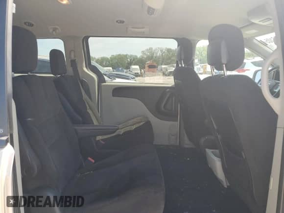 2014 Dodge Grand Caravan SXT z VIN 2C4RDGCG7ER321169, wystawiony jako Copart lot #70516105 z przebiegiem 187 876 mil mil oraz Szkoda całkowita • Salvage title. Historia ofert i sprzedaży dostępna na DreamBid. Obrazek 11.