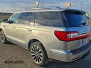 ✅ 2021 Lincoln Navigator Reserve • VIN: 5LMJJ2KT2MEL15047 • Lot: 96844425. Listed on Copart with 113,066 mi. Free auction sales archive from the USA and detailed vehicle history report at DreamBid. Image 3.