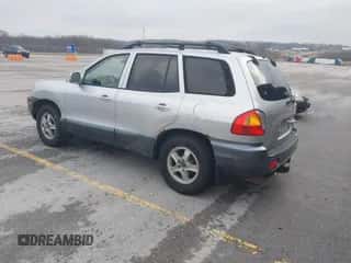 2001 Hyundai Santa Fe GLS z VIN KM8SC83DX1U054408, wystawiony jako IAAI lot #41498025 z przebiegiem 159 366 mil mil oraz . Historia ofert i sprzedaży dostępna na DreamBid. Obrazek 3.