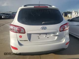 ✅ 2012 Hyundai Santa Fe Limited • VIN: 5XYZK4AG0CG104670 • Lot: 74339274. Listed on Copart with 69,102 mi. Free auction sales archive from the USA and detailed vehicle history report at DreamBid. Image 6.