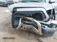 ✅ 2017 Toyota Tacoma SR5 • VIN: 5TFBZ5DN7HX002249 • Lot: 42136759. Listed on IAAI with 144,477 mi. Free auction sales archive from the USA and detailed vehicle history report at DreamBid. Image 6.