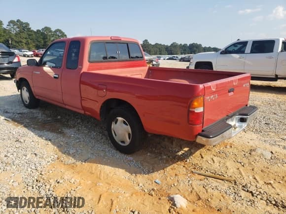 ✅ 1999 Toyota Tacoma • VIN: 4TAVL52N7XZ404241 • Lot: 80502325. Listed on Copart with 126,029 mi. Free auction sales archive from the USA and detailed vehicle history report at DreamBid. Image 2.