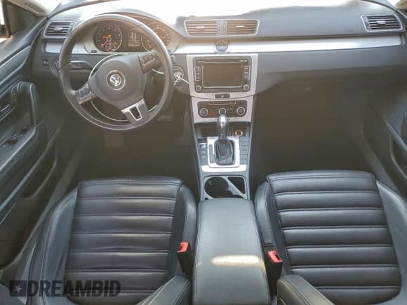 ✅ 2012 Volkswagen CC Sport • VIN: WVWMP7AN1CE544174 • Lot: 94519935. Listed on Copart with 163,045 mi. Free auction sales archive from the USA and detailed vehicle history report at DreamBid. Image 8.