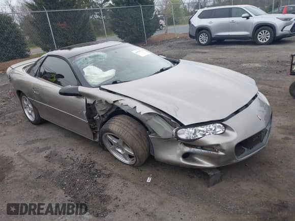 1999 Chevrolet Camaro z VIN 2G1FP22K2X2116432, wystawiony jako IAAI lot #41931771 z przebiegiem 124 879 mil mil oraz . Historia ofert i sprzedaży dostępna na DreamBid. Obrazek 1.