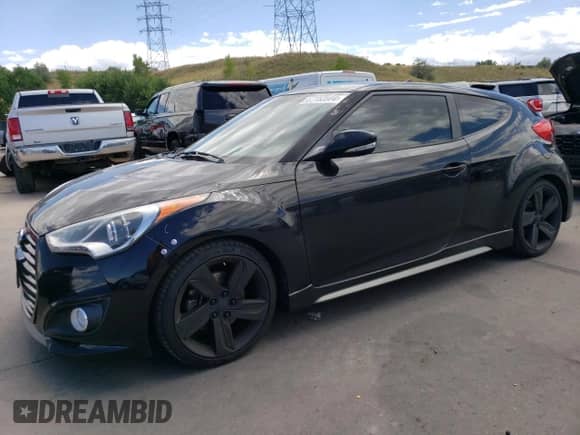 2014 Hyundai Veloster Turbo с VIN KMHTC6AE3EU189109, выставлен на аукционе Copart как лот 67153984 с пробегом 77 979 миль миль и Списание • Salvage title. История ставок и продаж доступна на DreamBid. Изображение 1.