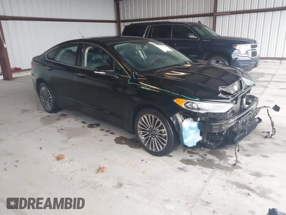 ✅ 2018 Ford Fusion Titanium • VIN: 3FA6P0D96JR138681 • Lot: 43520422. Listed on IAAI with 107,655 mi. Free auction sales archive from the USA and detailed vehicle history report at DreamBid. Image 1.