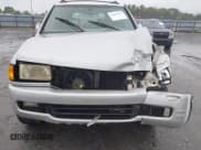 ✅ 1999 Honda Passport LX • VIN: 4S6CK58W0X4412065 • Lot: 43103615. Listed on IAAI with 300,793 mi. Free auction sales archive from the USA and detailed vehicle history report at DreamBid. Image 13.