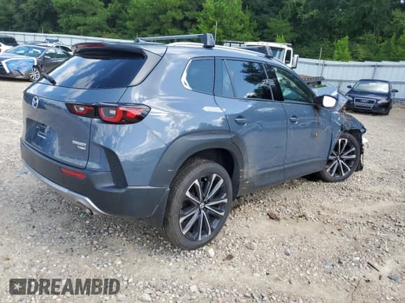 ✅ 2025 Mazda CX-50 Premium • VIN: 7MMVABDYXSN326134 • Лот: 69367495. Опубликован ранее на Copart с пробегом Не указан. Бесплатный доступ к архиву аукционных продаж из США и подробный отчёт об истории автомобиля на DreamBid. Изображение 3.