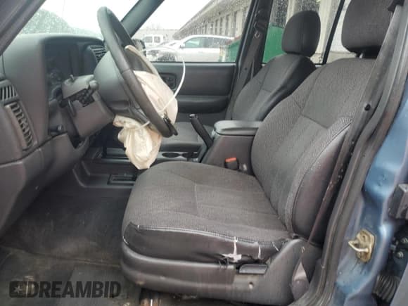 ✅ 1999 Jeep Cherokee Sport • VIN: 1J4FF68S4XL583029 • Lot: 52030175. Listed on Copart with 294,502 mi. Free auction sales archive from the USA and detailed vehicle history report at DreamBid. Image 7.