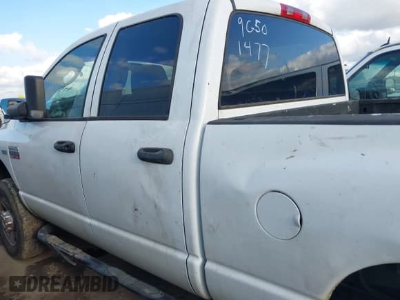 ✅ 2009 Dodge 2500 SLT • VIN: 3D7KS28T79G501477 • Лот: 41291975. Опубликован ранее на IAAI с пробегом 195 652 миль. Бесплатный доступ к архиву аукционных продаж из США и подробный отчёт об истории автомобиля на DreamBid. Изображение 14.