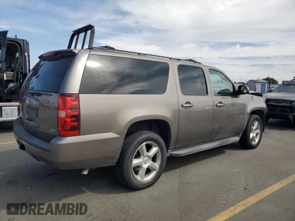 ✅ 2011 Chevrolet Suburban LS • VIN: 1GNSKHE34BR265840 • Lot: 81604565. Listed on Copart with 123,754 mi. Free auction sales archive from the USA and detailed vehicle history report at DreamBid. Image 3.