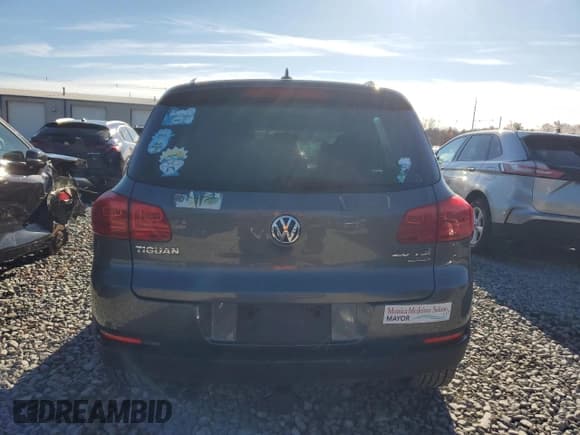 ✅ 2013 Volkswagen Tiguan S • VIN: WVGBV3AXXDW585174 • Lot: 93643875. Listed on Copart with 143,089 mi. Free auction sales archive from the USA and detailed vehicle history report at DreamBid. Image 6.