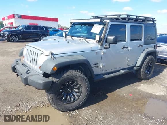 ✅ 2012 Jeep Wrangler Unlimited Sport • VIN: 1C4HJWDG0CL189603 • Lot: 43586706. Wystawiony na IAAI z przebiegiem 105 980 mil. Bezpłatny archiwum sprzedaży aukcyjnych z USA i szczegółowy raport historii pojazdu na DreamBid. Zdjęcie 2.