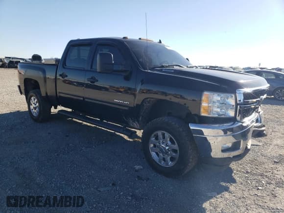 ✅ 2014 Chevrolet Silverado 2500HD High Country • VIN: 1GC1KXEG8EF186954 • Лот: 84078324. Опубликован ранее на Copart с пробегом 129 232 миль. Бесплатный доступ к архиву аукционных продаж из США и подробный отчёт об истории автомобиля на DreamBid. Изображение 4.
